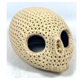 Lot 879  Alexander Ney Elongated Skull Pierced Terra-Cotta Sculpture Signed and Dated 1987