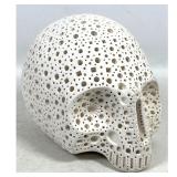 Lot 881  Alexander Ney reticulated Terracotta skull sculpture. Off white matte finished clay with geometric p