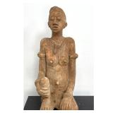 Lot 934  West African Djenne Style Terracotta Seated Female Figure. She wears hip wrap and jewelry. Pedestal 