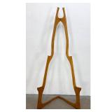 Lot 946  Mid-Century Modern Sculptural Folding Wooden Display Easel with Integrated Notches. Unsigned.