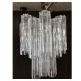 Lot 989  Tiered Murano Glass Chandelier . Textured Scalloped Glass Tubes. Two Tiered Silver Metal Frame