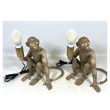 Lot 1034  Pair of Gold Tone Resin Seated Monkey Table Lamps with Modern Braided Cords. Unsigned.