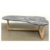 Lot 1036  Decorator Marble and wood Coffee Table. Tripoint base. After a Robsjohn Gibbings Design. 