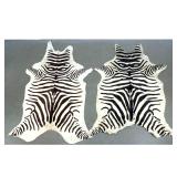 Lot 1046  2pcs Zebra Printed Natural Cow Hide Rugs. 