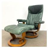 Lot 1076  Ekornes Stressless Recliner and Ottoman Set in Green Leather with Oak Finish Bases