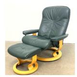 Lot 1079  Ekornes Stressless recliner and matching ottoman in green leather with bentwood swivel base. Made in
