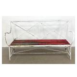 Lot 1228  Regency English wrought iron and wood 3 seat garden bench with arrow and fletching motifs.